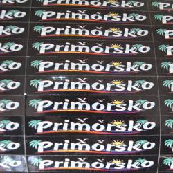 сувенир- рул от дърво с реалистични материали, надписан с 3 надписа PRIMORSKO/Bulgaria/PRIMORSKO 20x20 см.#